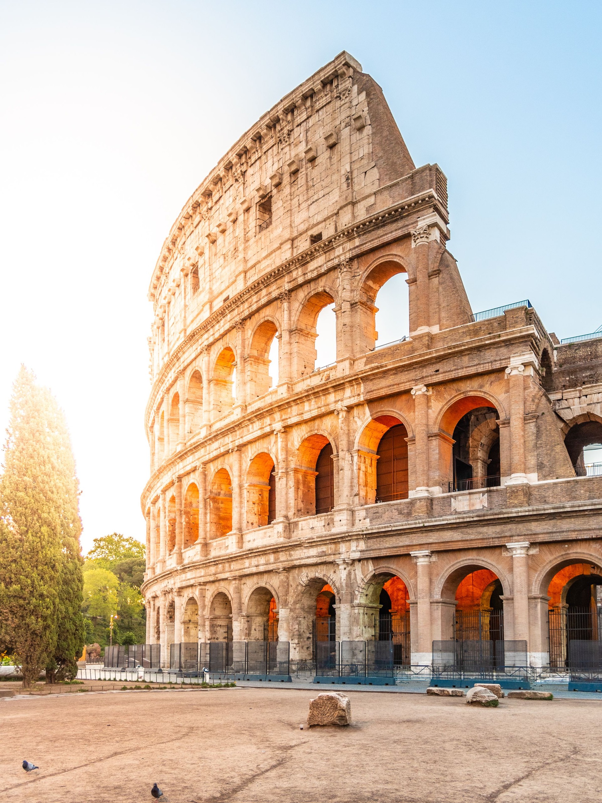 Colosseum, or Coliseum. Morning sunrise at huge Roman amphitheatre, Rome, Italy.